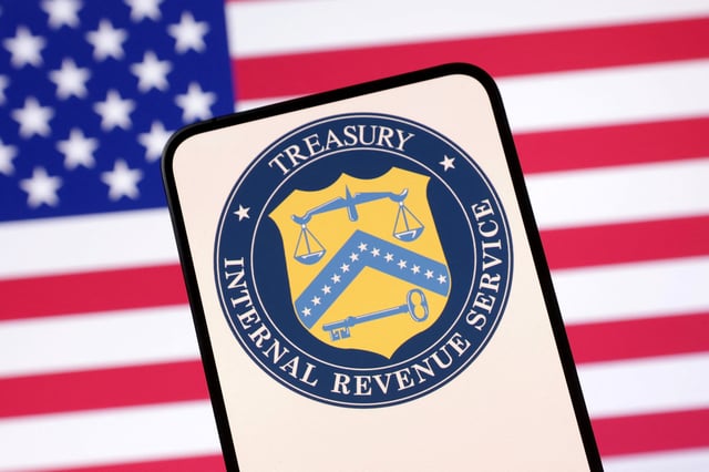 United States Department of the Treasury logo and U.S. flag are seen in this illustration taken April 23, 2025. REUTERS/Dado Ruvic/Illustration/File Photo