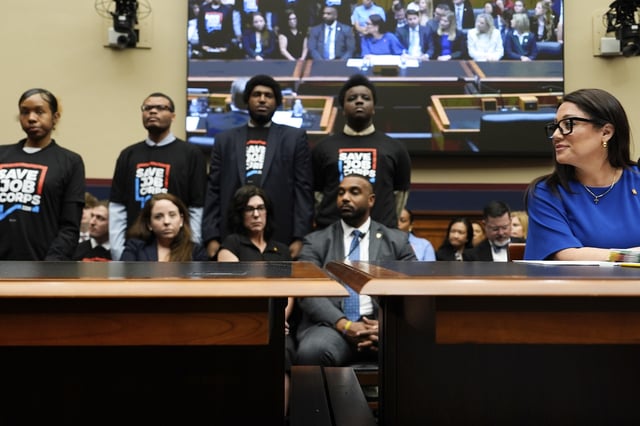 Secretary of Labor Lori Chavez-DeRemer looks as Job Corps members stand behind her during a House Education and Workforce hearing, Thursday, June 5, 2025, on Capitol Hill in Washington. (AP Photo/Julia Demaree Nikhinson)