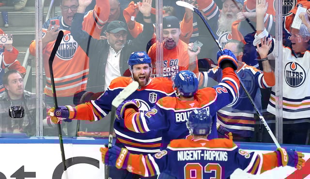 EDMONTON, CANADA – JUNE 04: Leon Draisaitl #29 celebrates with Evan Bouchard #2 and Ryan Nugent-Hopkins #93 of the Edmonton Oilers after scoring during the first overtime period against the Florida Panthers in Game One of the 2025 Stanley Cup Final at Rogers Place on June 04, 2025 in Edmonton, Alberta, Canada. (Photo by Steph Chambers/Getty Images)