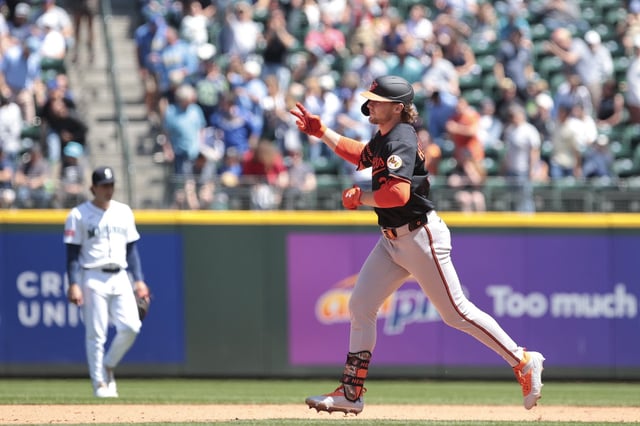Baltimore Orioles' Gunnar Henderson jogs the bases after hitting a home run off Seattle Mariners starting pitcher Bryan Woo during the sixth inning of a baseball game, Thursday, June 5, 2025, in Seattle. (AP Photo/Jason Redmond)
