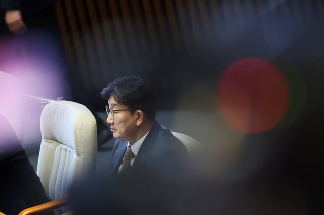 South Korea’s ruling People Power Party floor leader Kweon Seong-dong sits during the impeachment vote of a plenary session for South Korean acting President and Prime Minister Han Duck-soo at the National Assembly in Seoul, South Korea, December 27, 2024.   REUTERS/Kim Hong-Ji/File photo