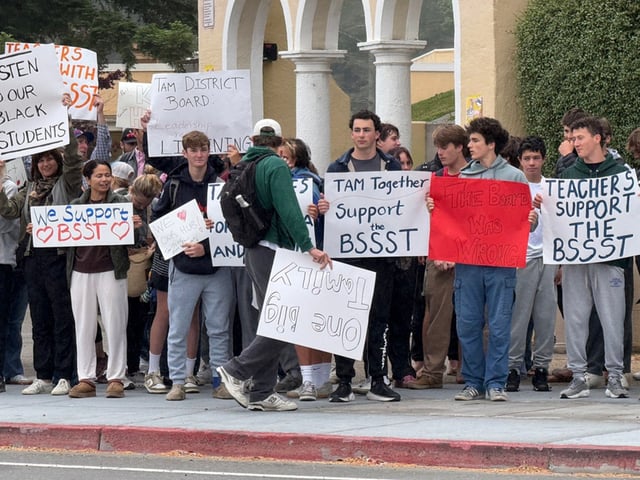 Demonstrators rally in front of Tamalpais High School in Mill Valley on Thursday, June 5, 2025, over the district&#39;s decision not to extend contracts for two consultants who support Black students. (Photo by Preston Picus)