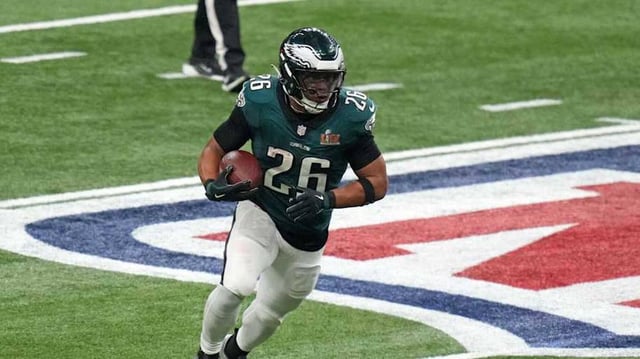 Feb 9, 2025; New Orleans, LA, USA; Philadelphia Eagles running back Saquon Barkley (26) rushes the ball against the Kansas City Chiefs during the third quarter in Super Bowl LIX  at Caesars Superdome.