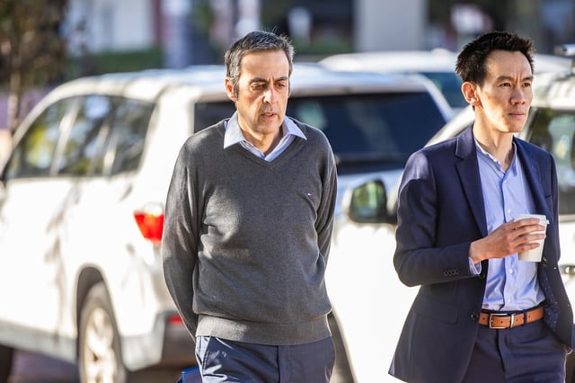 Steven James Naoum (left) arrives at Joondalup Court on Friday morning. He allegedly choked an 11-year-old boy at a soccer match in Mindarie last month. Kelsey Reid