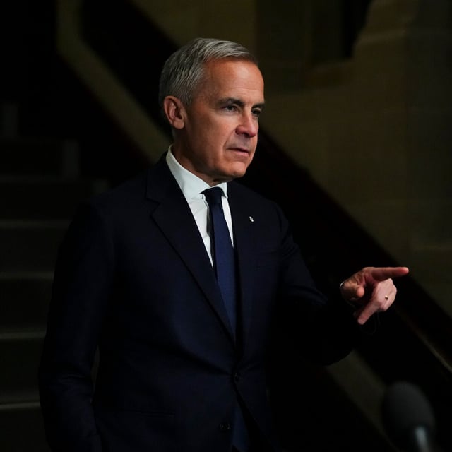 Prime Minister Mark Carney arrives to a caucus meeting on Parliament Hill on Wednesday.