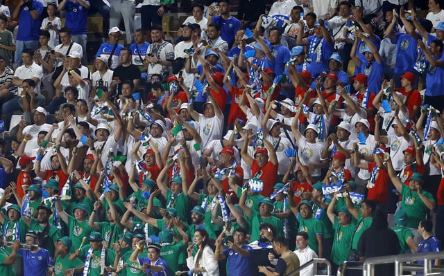 Soccer Football - World Cup - AFC Qualifiers - Group A - United Arab Emirates v Uzbekistan - Al Nahyan Stadium, Abu Dhabi, United Arab Emirates - June 5, 2025 Uzbekistan fans in the stands. REUTERS/Rula Rouhana