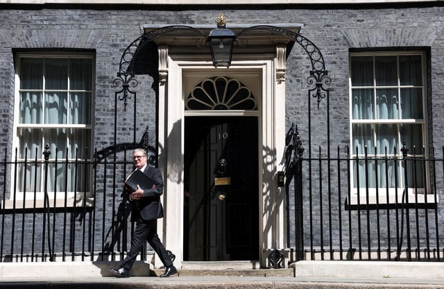 British Prime Minister Keir Starmer leaves 10 Downing Street in London, Britain, May 14, 2025. REUTERS/Toby Melville/File Photo