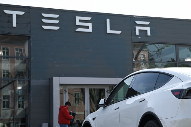 A Tesla electric vehicle is parked at a Tesla dealership, after Tesla, Inc. released its financial results for the first quarter of 2025, in Berlin, Germany April 23, 2025. REUTERS/Annegret Hilse/File Photo