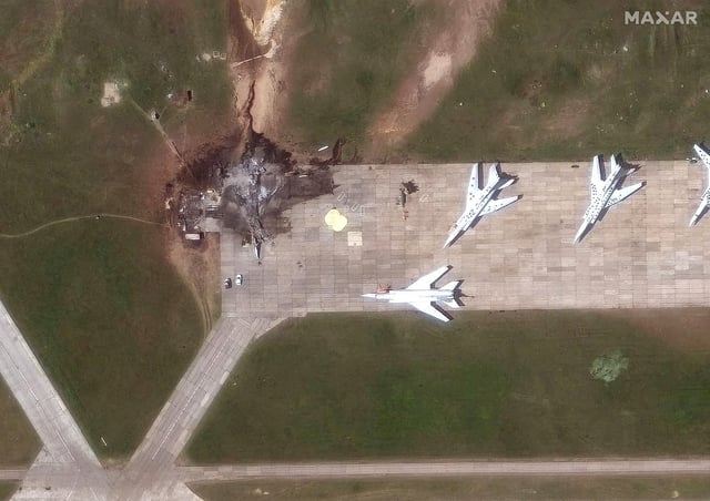 A satellite image shows a destroyed TU 22 aircraft in the aftermath of a drone strike at the Belaya air base, Irkutsk region, Russia, June 4, 2025, Maxar Technologies/Handout via REUTERS/File Photo