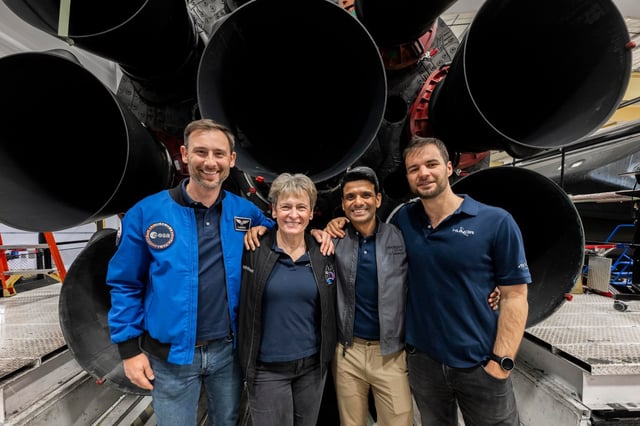 The Axiom Space Ax-4 mission crew stands in front of a SpaceX Falcon 9 booster ahead of their mission to the International Space Station. (Courtesy/SpaceX)