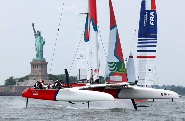 SailGP F50 team Canada competes in front of the Statue of Liberty after the start of the finals race during the SailGP sailboat racing event won by team New Zealand in New York Harbor, New York City, U.S. June 23, 2024. REUTERS/Mike Segar/File Photo