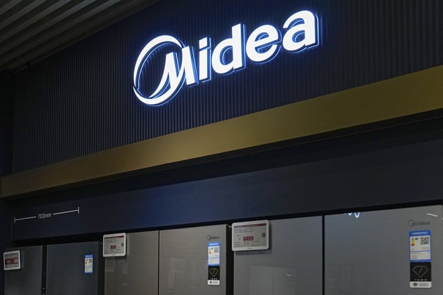 FILE - Midea's fridges are seen at an electronic shop in Beijing on Nov. 15, 2021. (AP Photo/Andy Wong, file)