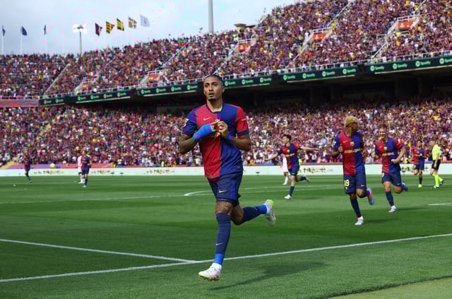 Soccer Football - LaLiga - FC Barcelona v Real Madrid - Estadi Olimpic Lluis Companys, Barcelona, Spain - May 11, 2025 FC Barcelona's Raphinha celebrates scoring their fourth goal REUTERS/Albert Gea/File Photo