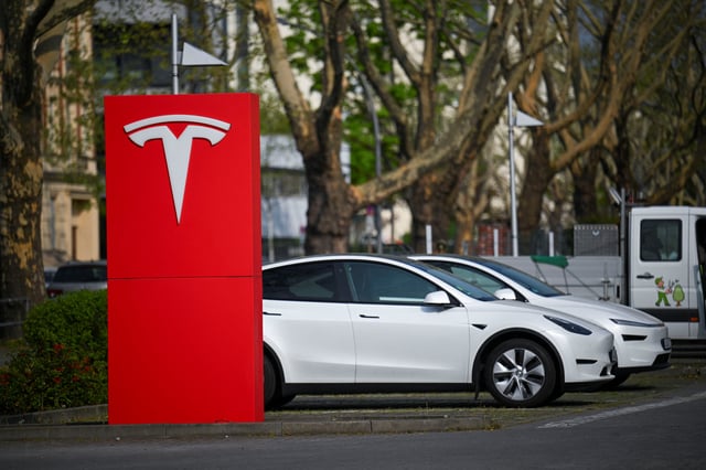 Tesla electric vehicles are parked at a Tesla dealership, after Tesla, Inc. released its financial results for the first quarter of 2025, in Berlin, Germany April 23, 2025. REUTERS/Annegret Hilse/File Photo