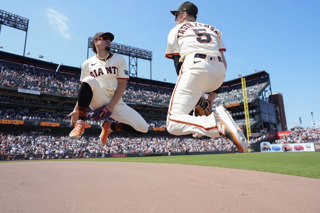 SAN FRANCISCO, CALIFORNIA - JUNE 5: Willy Adames #2 and Mike Yastrzemski #5 of the San Francisco Giants high five after the game against the San Diego Padres at Oracle Park on June 5, 2025 in San Francisco, California. (Photo by Suzanna Mitchell/San Francisco Giants/Getty Images)