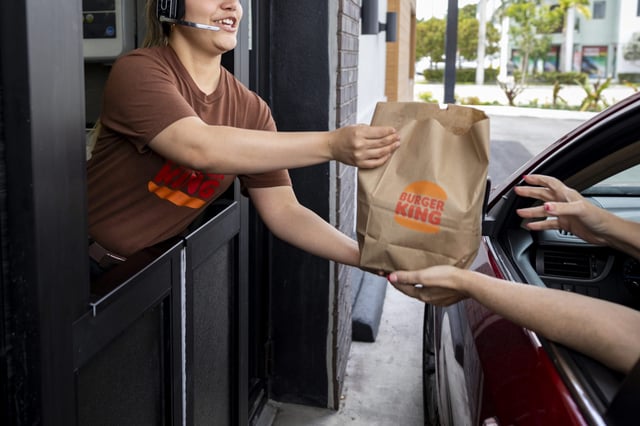 Mykale Baker has been working at Burger King to raise money for college.