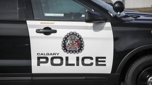 A Calgary Police Service logo is seen on a vehicle parked at headquarters in Calgary, April 9, 2020. THE CANADIAN PRESS/Jeff McIntosh