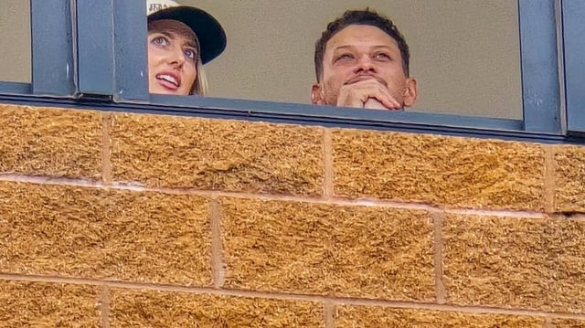 Patrick Mahomes and his wife, Brittany, attend the Texas Tech softball team’s Game 2 contest against Texas in the championship of the Women’s College World Series, Thursday, June 5, 2025, at Devon Park in Oklahoma City.
