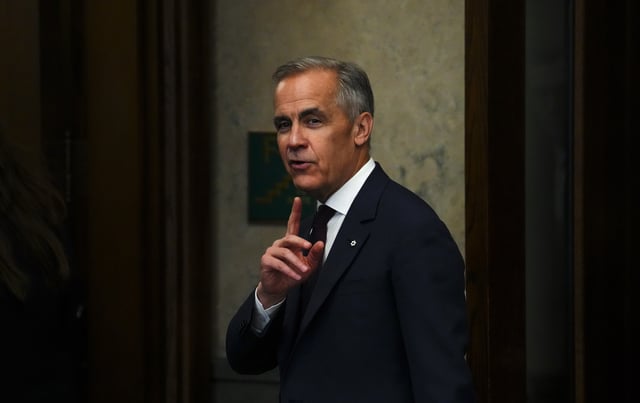 Prime Minister Mark Carney makes his way through the foyer of the House of Commons on Parliament Hill in Ottawa on Thursday, June 5, 2025. THE CANADIAN PRESS/Sean Kilpatrick
