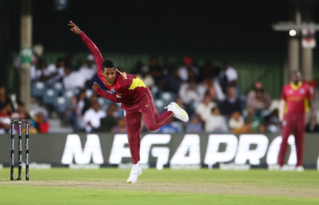 Cricket - Second One Day International - South Africa v West Indies - Buffalo Park, East London, South Africa - March 18, 2023 West Indies' Akeal Hosein in action REUTERS/Siphiwe Sibeko/File Photo