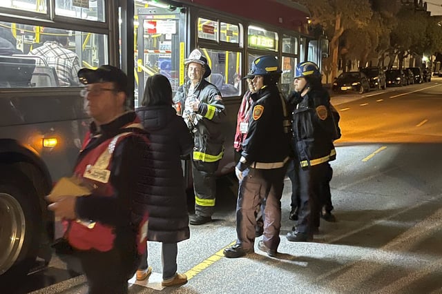 About 50 people evacuated from their homes, taking shelter in a Muni bus as firefighters extinguished a multi-building fire in San Francisco on June 6, 2025.