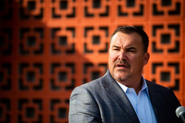 Entrepreneur and national prison reform advocate Josh Smith speaks at a ribbon cutting event for Men of Valor's Dogan-Gaither Flats in Knoxville, Tenn., on Sept. 19, 2022.