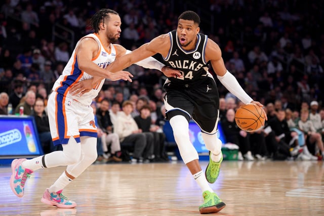 Giannis Antetokounmpo #34 of the Milwaukee Bucks drives to the basket defended by Jalen Brunson #11 of the New York Knicks during the second half at Madison Square Garden on January 12, 2025 in New York City.