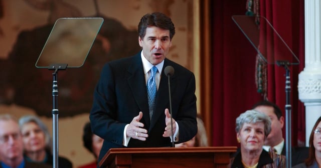 Governor Rick Perry delivers his State of the State speech to a joint session of the Texas Legislature on Feb. 12, 2003.