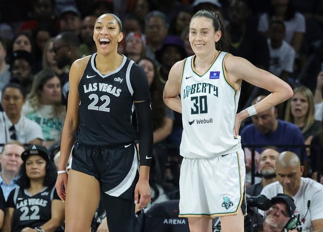 A&#39;ja Wilson #22 of the Las Vegas Aces and Breanna Stewart #30 of the New York Liberty wait for a Liberty player to shoot a free throw in the second quarter of their game at Michelob ULTRA Arena on June 15, 2024 in Las Vegas, Nevada. The Liberty defeated the Aces 90-82.