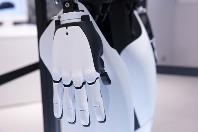 Detail of Tesla's Optimus humanoid robot's hand on display inside the Tesla pop-up store near Shibuya crossing. In April 2025, Tesla opened a pop-up store in Shibuya, Tokyo, strategically located just a minute's walk from Shibuya Station. The store showcases the new Model Y and Model 3, along with the Optimus robot, offering an interactive experience for visitors. This temporary setup aims to boost brand visibility and engage potential customers in one of Tokyo’s busiest districts, aligning with Tesla’s strategy to expand its presence in Japan’s electric vehicle market.
