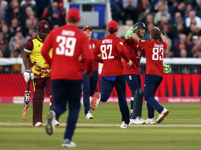 Cricket - First Twenty20 International - England v West Indies - Seat Unique Riverside, Durham, Britain - June 6, 2025 England's Jos Buttler celebrates with teammates after he takes the wicket of West Indies' Johnson Charles, stumped off the bowling of England's Liam Dawson Action Images via Reuters/Lee Smith