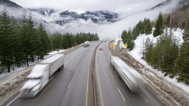 Vehicles drive along the Coquihalla Highway, January 19, 2022. THE CANADIAN PRESS/Jonathan Hayward