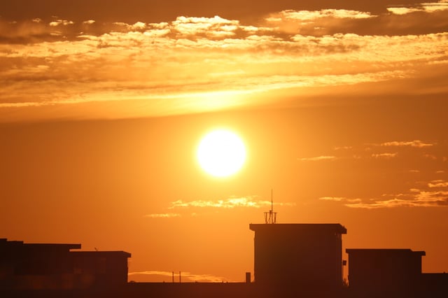 Celestial delights in Toronto!  The sun is rising on a hot summer Day.