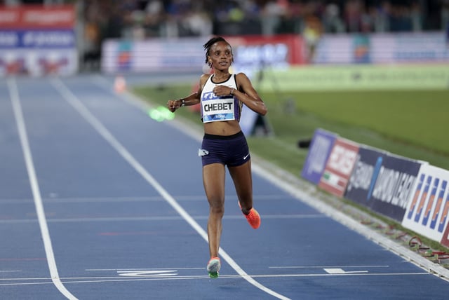 Athletics - Diamond League - Rome - Stadio Olimpico, Rome, Italy - June 6, 2025 Kenya's Beatrice Chebet crosses the line to win the women's 5000m final REUTERS/Remo Casilli