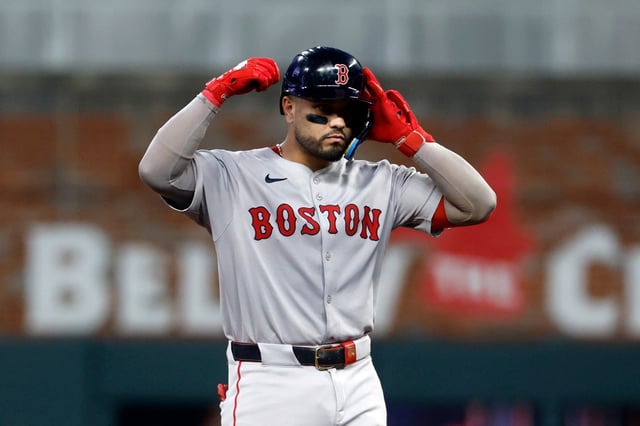 Boston Red Sox&#39;s Carlos Narváez reacts after hitting a double during the inning of a baseball game against the Atlanta Braves, Friday, May 30, 2025, in Atlanta. (AP Photo/Butch Dill)