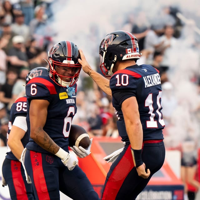 Montreal Alouettes quarterback Davis Alexander (10) celebrates with Montreal Alouettes wide receiver Tyson Philpot (6) after a successful touchdown pass during first half CFL action against the Toronto Argonauts, in Montreal on Friday, June 6, 2025. THE CANADIAN PRESS/Christopher Katsarov