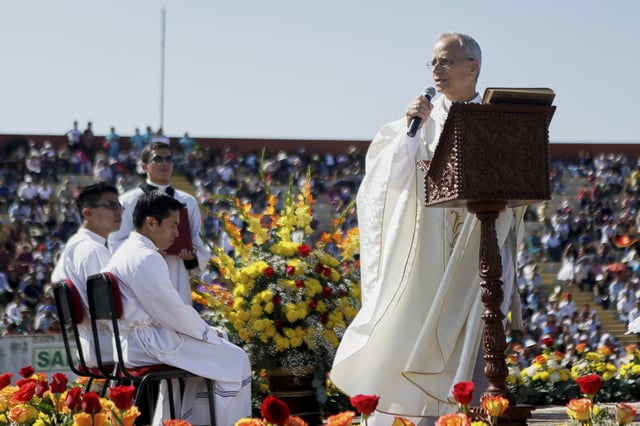 FILE - Pope Leo XIV, then Apostolic Administrator of Chiclayo Robert Prevost, preaches during a Corpus Christi celebration in a stadium in Chiclayo, Peru, Friday, June 19, 2015. (AP Photo/Julio Reano, File)