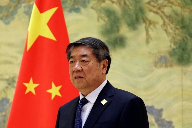 Chinese Vice Premier He Lifeng waits for a photo session with Britain's Chancellor of the Exchequer Rachel Reeves (not pictured) before the China-UK Financial Services Summit, at the Diaoyutai State Guesthouse in Beijing, China January 11, 2025. REUTERS/Florence Lo//File Photo