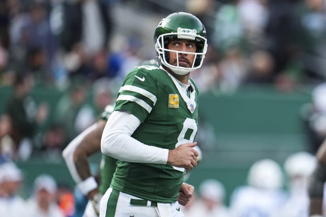 Aaron Rodgers #8 of the New York Jets looks on from the field during an NFL football game against the Indianapolis Colts at MetLife Stadium on November 17, 2024 in East Rutherford, New Jersey