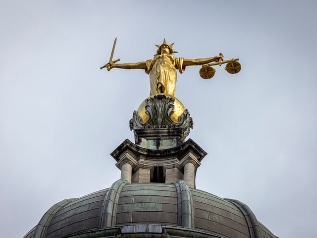 A gold statue of Lady Justice sits on top of the central criminal court on the 11th of March 2025 in London, United Kingdom. The Central Criminal Court of England and Wales, commonly referred to as the Old Bailey after the street on which it stands, is a criminal court building in central London, one of several that house the Crown Court of England and Wales (photo by Andrew Aitchison / In pictures via Getty Images)