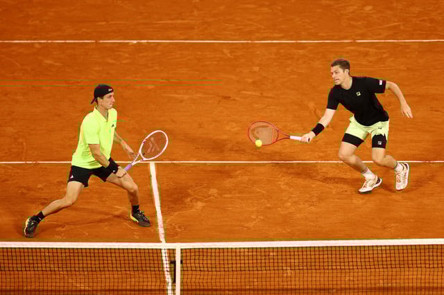 Tennis - French Open - Roland Garros, Paris, France - June 7, 2025 Britain's Neal Skupski and Britain's Joe Salisbury in action during the men's doubles final against Argentina's Horacio Zeballos and Spain's Marcel Granollers REUTERS/Lisi Niesner