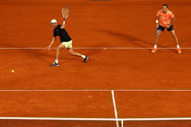 Tennis - French Open - Roland Garros, Paris, France - June 7, 2025 Argentina's Horacio Zeballos and Spain's Marcel Granollers in action during the men's doubles final against Britain's Neal Skupski and Britain's Joe Salisbury REUTERS/Lisi Niesner