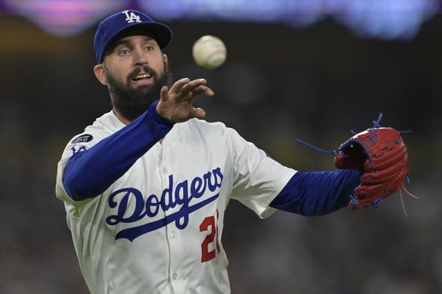 Jun 4, 2025; Los Angeles, California, USA;  Los Angeles Dodgers starting pitcher Tony Gonsolin (26) throws New York Mets catcher Luis Torrens (13) out at first in the fifth inning at Dodger Stadium. Mandatory Credit: Jayne Kamin-Oncea-Imagn Images/File photo
