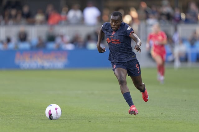 Jun 7, 2025; San Jose, California, USA;  Bay FC forward Racheal Kundananji (9) chases after the ball during the second half against the Portland Thorns FC at PayPal Park. Mandatory Credit: Stan Szeto-Imagn Images