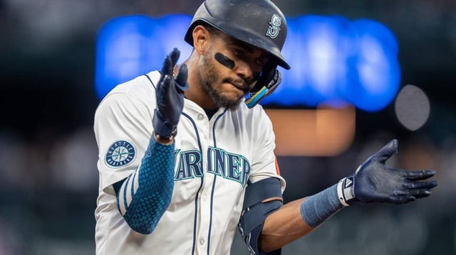 May 27, 2025; Seattle, Washington, USA;  Seattle Mariners centerfielder Julio Rodriguez (44) celebrates after hitting a single during the eighth inning against the Washington Nationals at T-Mobile Park. Mandatory Credit: Stephen Brashear-Imagn Images