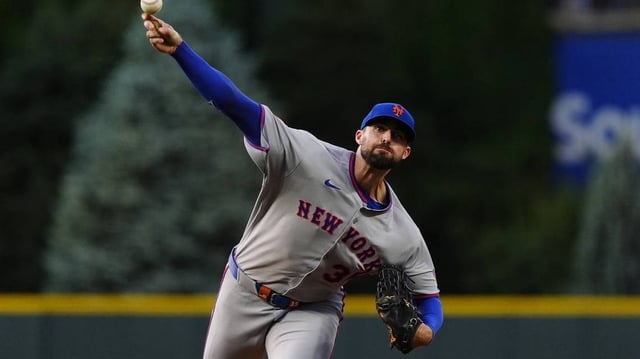 Jun 7, 2025; Denver, Colorado, USA; New York Mets starting pitcher Clay Holmes (35) delivers a pitch in the first inning against the New York Mets at Coors Field. Mandatory Credit: Ron Chenoy-Imagn Images