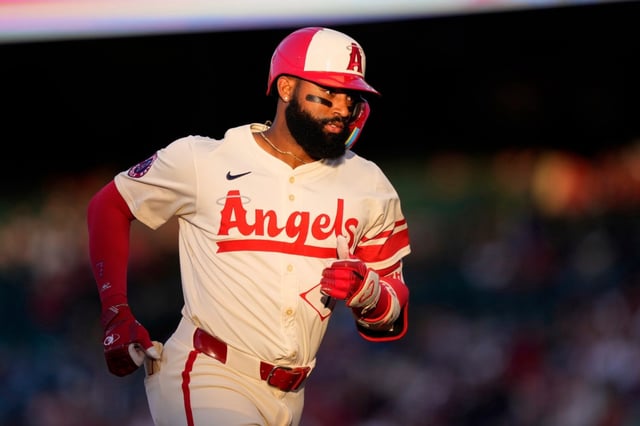 Angels’ Jo Adell rounds third after hitting a solo home run during the second inning of a baseball game against the Seattle Mariners, Saturday, June 7, 2025, in Anaheim, Calif. (AP Photo/Mark J. Terrill)
