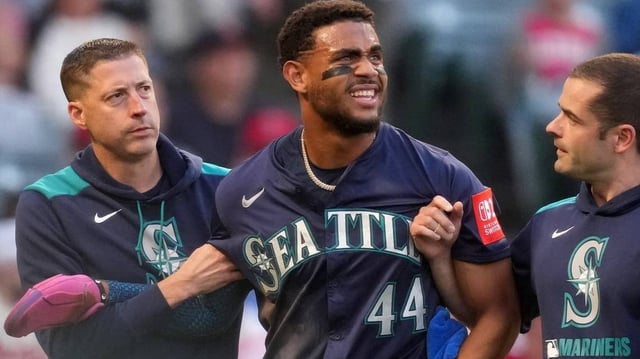 Jun 7, 2025; Anaheim, California, USA; Seattle Mariners center fielder Julio Rodriguez (44) leaves the game after being hit by a batted ball in the third inning against the Los Angeles Angels at Angel Stadium. Mandatory Credit: Kirby Lee-Imagn Images