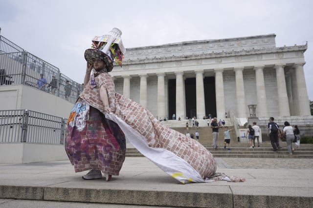 Tyler Cargill poses for a photo during the World Pride Rally and March at the Lincoln Memorial, Sunday, June 8, 2025, on the National Mall in Washington. (AP Photo/Alex Brandon)