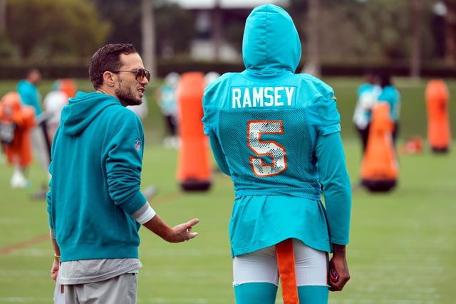 Miami Dolphins head coach Mike McDaniel speaks to cornerback Jalen Ramsey (5) during practice at Baptist Health Miami Dolphins training complex in Miami Gardens on Wednesday, Dec. 20, 2023. (Amy Beth Bennett / South Florida Sun Sentinel)